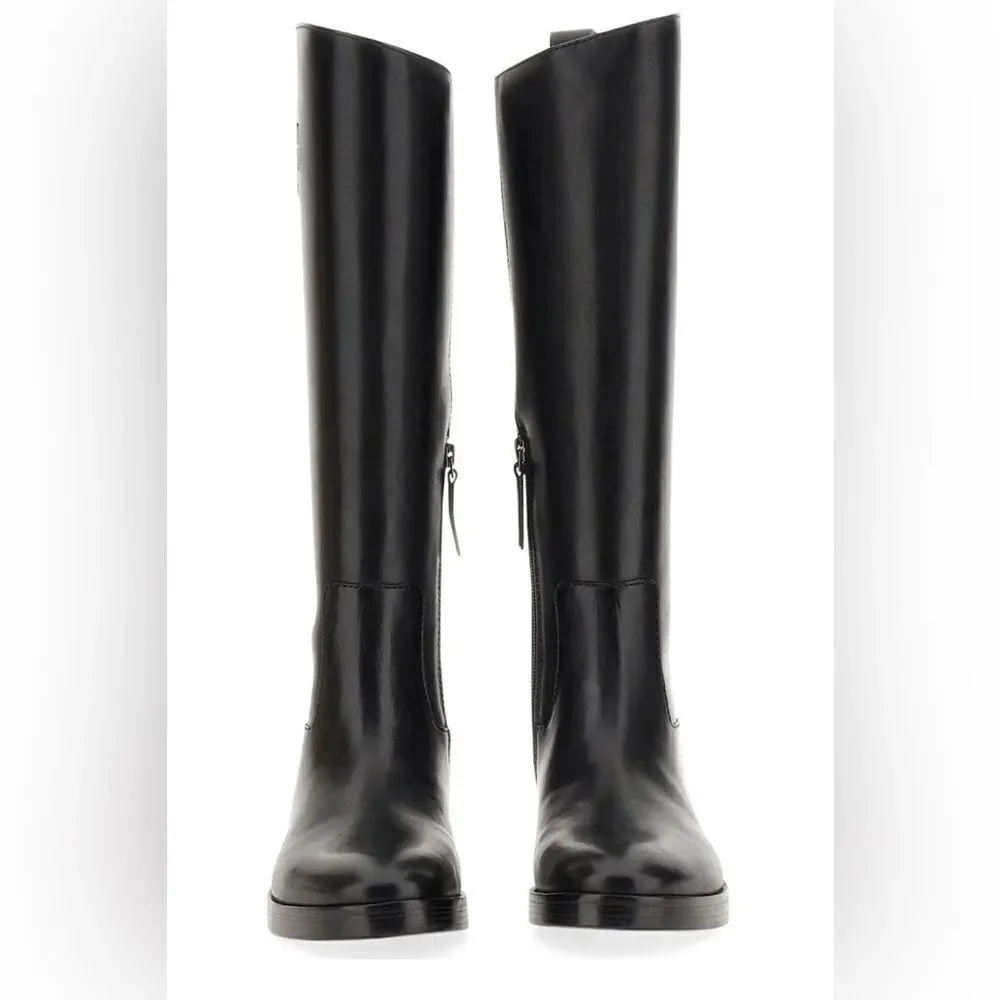 Tory Burch | Tory Burch Logo Embossed Riding Boots in Black | 6.5 M